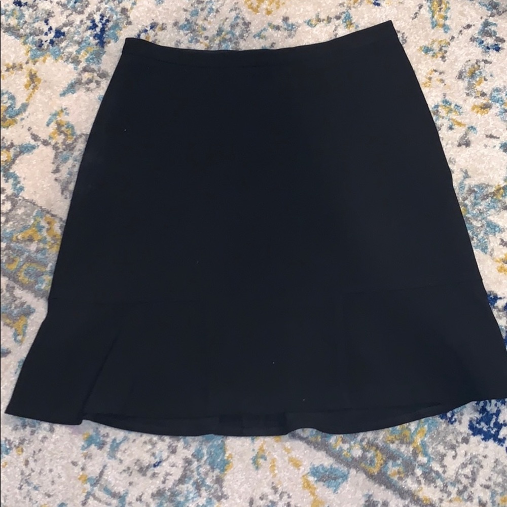 Limited size 0 black work skirt.